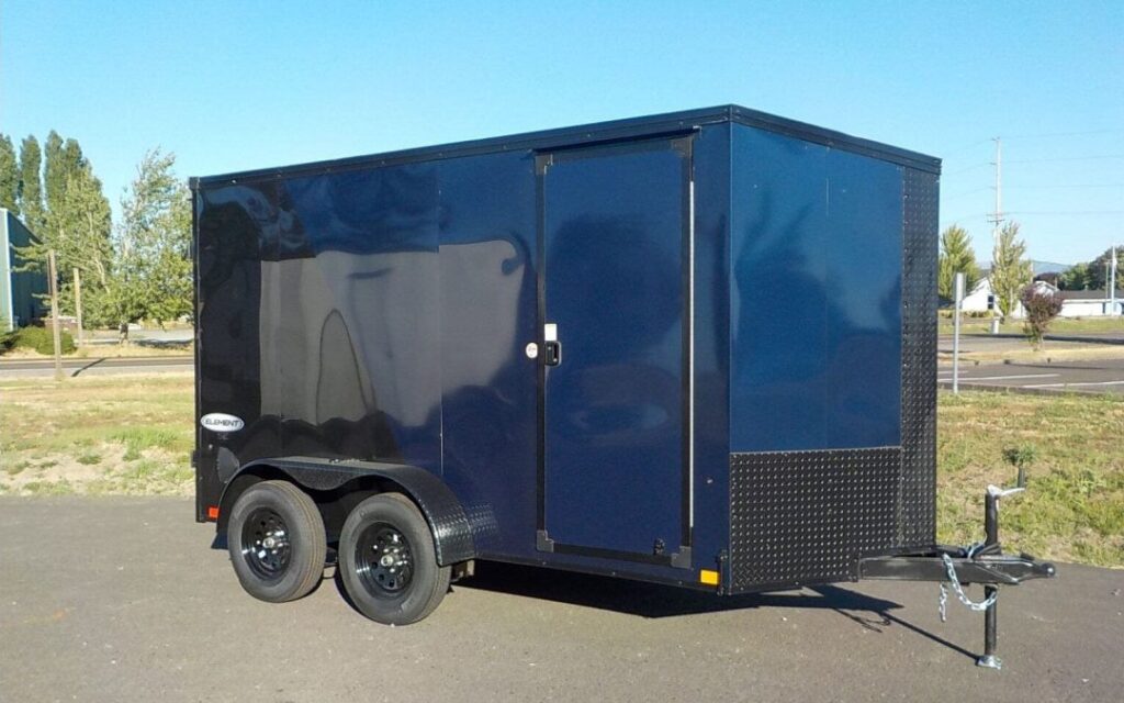 Blue and black enclosed cargo trailer for rent in Buda, TX - Hill Country Haulers equipment